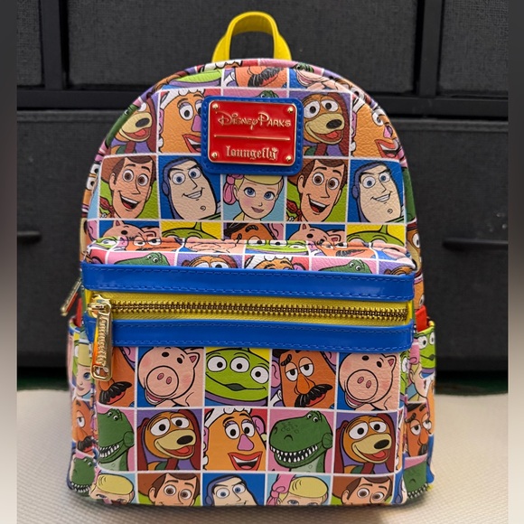 Disney Handbags - Disney Colorful Toy Story Mini Backpack